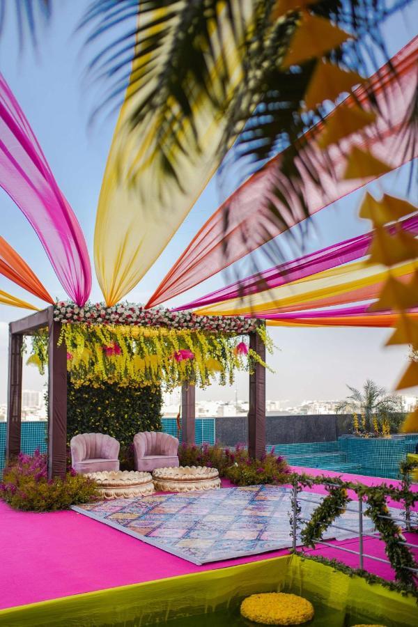 Radisson Blu Hotel New Delhi Dwarka Экстерьер фото A mandap decorated with colourful fabrics