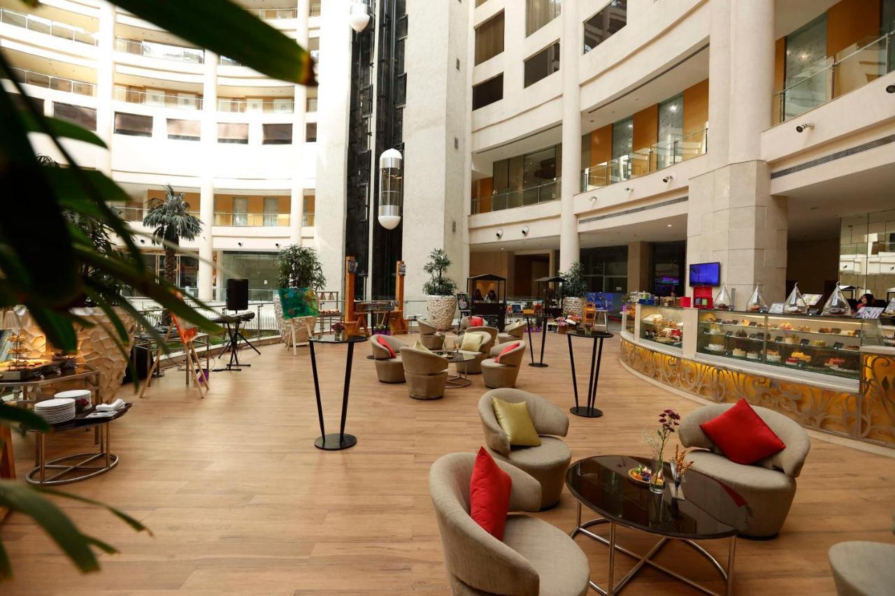 Radisson Blu Hotel New Delhi Dwarka Экстерьер фото The lobby of the hotel